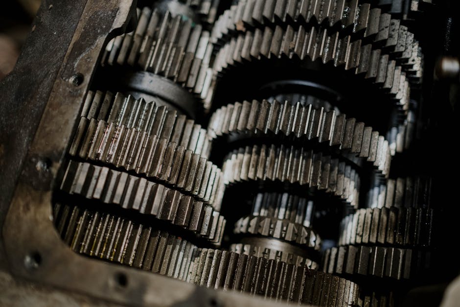 bobo_engine_gearbox Detailed shot of mechanical gears showcasing intricate steel parts and engineering precision.